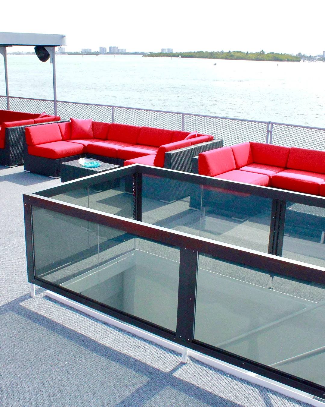 Open deck and glass stairwell aboard Opus Yacht Miami